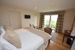 Bedroom one (first floor) with sea views and ensuite- click for photo gallery